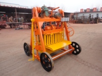 Machine à fabriquer des blocs de béton de type pondeuse mobile à faible coût, machine manuelle portable à briques creuses en ciment pour petites entreprises