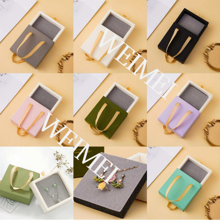 Box with ribbon handle