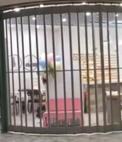 Porte coulissante automatique pliante en gros, matériau transparent, porte de magasin, porte pliante en polycarbonate