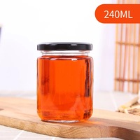 Khusus Kosong Selai Kacang Berbentuk Batu Api Kaca Mewah Toples Saus Makanan Acar Bumbu Jam Kaca Madu Jar dengan Tutup Hitam
