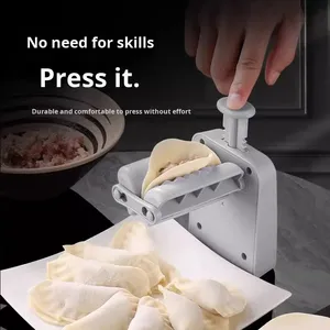 Machine à raviolis multifonctionnelle entièrement automatique à pression manuelle pour usage domestique, modèle Chaozhou CafEwkfD, petite machine de gros - Product Image 1