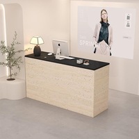 Comptoir de réception minimaliste noir Q101 avec ordinateur Apple pour les petites entreprises