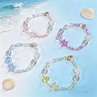 Bracelet féminin au design unique et minimaliste, thème Océan Rêveur style Forêt, avec étoiles et coquillages, polyvalent, idéal pour les étudiantes