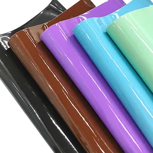 Commercio all'ingrosso specchio tinta unita ecopelle lucida colore neon vinile pvc tessuto in pelle sintetica per artigianato borse haribows