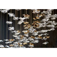 Lustre personnalisé avec feuilles de verre flottantes dorées transparentes pour hall d'hôtel, salon de villa, lustre artistique