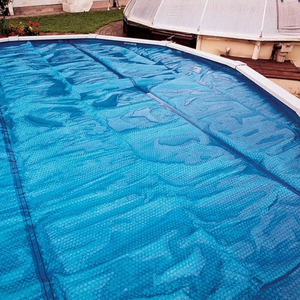 Couverture solaire durable et écologique pour <span class=keywords><strong>piscine</strong></span> avec <span class=keywords><strong>protection</strong></span> UV pour <span class=keywords><strong>piscine</strong></span> enterrée, option personnalisée en vente - Product Image 2