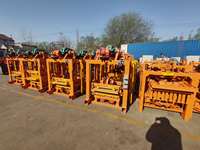 Machine de pose de briques de pavage Machine de fabrication de blocs de ciment automatique QTJ4-40 Machines à briques de blocage automatique