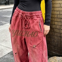 Pantalon de jogging homme en molleton 100% coton, coupe oversize, avec logo personnalisé, ourlet brut vieilli, effet délavé soleil et délavage acide, en French Terry