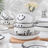 Offre Spéciale moderne Simple noir visage souriant Design ensemble de vaisselle en céramique assiette bol en gros pour la vaisselle à usage domestique