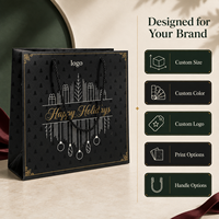 Sac cadeau en papier noir personnalisé pour Noël avec poignées en corde et impression UV sélective pour l'emballage de cadeaux de Noël en vente au détail