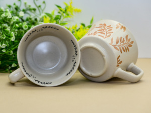 <span class=keywords><strong>Mug</strong></span> en céramique à imprimé feuilles botaniques, finition rustique mouchetée pour café et thé - Product Image 3