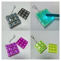 Nouveau capuchon de clavier à neuf touches, jouet de décompression, pendentif porte-clés, jouet lumineux à pression, multifonctionnel, vente en gros DIY