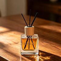 Bouteille en verre vide noire transparente carrée pour diffuseur de parfum avec bâtonnets en rotin, impression OEM pour la décoration intérieure, commande en gros