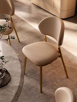 Chaise de salle à manger d'hôtel de luxe léger, dossier en cuir PU véritable, acier inoxydable haut de gamme, design moderne simple et écologique, petite taille