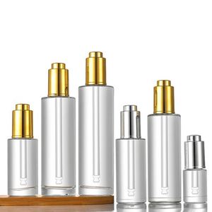Wholesale 2oz Round Cylinder Flat Shoulder Serum Dropper <b>Bottle</b> 60ml Essential Oil Glass <b>Bottle</b> With Gold Silver Press Dropper - Product Image 1