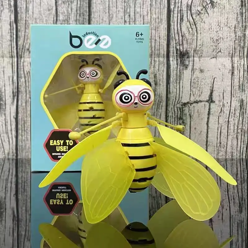 2024 Sportspiel zeug Spiele Infrarot Hand Sensing Bee Mini Flying Gyro Rotor Drohne UFO LED Finger Spinner Kinder Geschenke