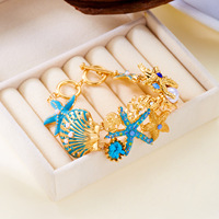 Ensemble Collier, Boucles d'Oreilles et Bracelet Plaqué Or Coquillage Étoile de Mer Corail – Cadeau Tendance pour Anniversaire de Mariage et Fête – Accessoire Femme Populaire