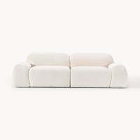 Canapé modulaire 3 places en tissu rembourré, style moderne et minimaliste, avec rembourrage en mousse, idéal pour appartement ou villa, décoration intérieure.