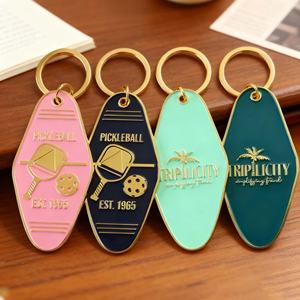 พวงกุญแจโลหะผสมสังกะสีชุบทองคำ พร้อมโลโก้สั่งทำจากโรงงาน ตัวอักษรเคลือบเงา ปรับแต่งได้ตามต้องการ - Product Image 1