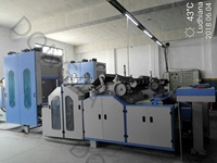 Machine à carder les fibres de lin et de chanvre