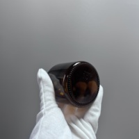 Flacon en verre ambré pour sirop contre la toux avec bouchon à vis et design sérigraphié pour le stockage de médicaments et de lotions