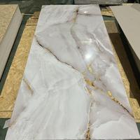 Film d'impression haute brillance à prix de gros, panneau mural en PVC, feuille de marbre, revêtement UV pour décoration intérieure, fond de télévision