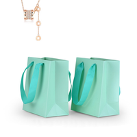 Sacs à provisions en papier d'art de luxe personnalisés pour bijoux artisanat bougie style classique avec votre propre logo pour emballage de cadeau d'affaires