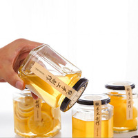 Vente en gros de pots en verre hexagonaux pour miel/confiture de 100 ml et 500 ml, emballage hexagonal, pot à miel avec couvercles en métal noir et or