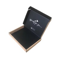 Cajas de cartón corrugado gris con relieve negro para zapatos, juguetes, ropa, mangos y calcetines de Navidad