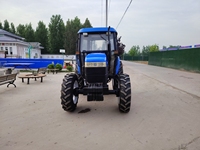 Vente directe d'usine : Tracteur agricole New Holland SNH704 4 cylindres de haute qualité (70 CV, 4 roues motrices) en excellent état.