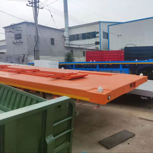 Semirremolque de Plataforma Plana de Acero Haoyue con Bloqueo Giratorio, Eje Doble, 60 Toneladas, Bajo, para Transporte de Contenedores - Product Image 1