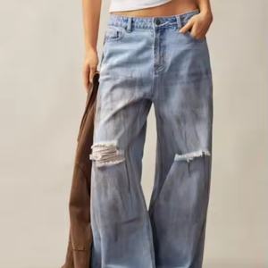 กางเกงยีนส์ขาบานเอวต่ำทรงหลวมสไตล์ลำลองแบบยีนส์เดนิมฟอกสีสำหรับผู้หญิง ขายส่ง OEM - Product Image 5