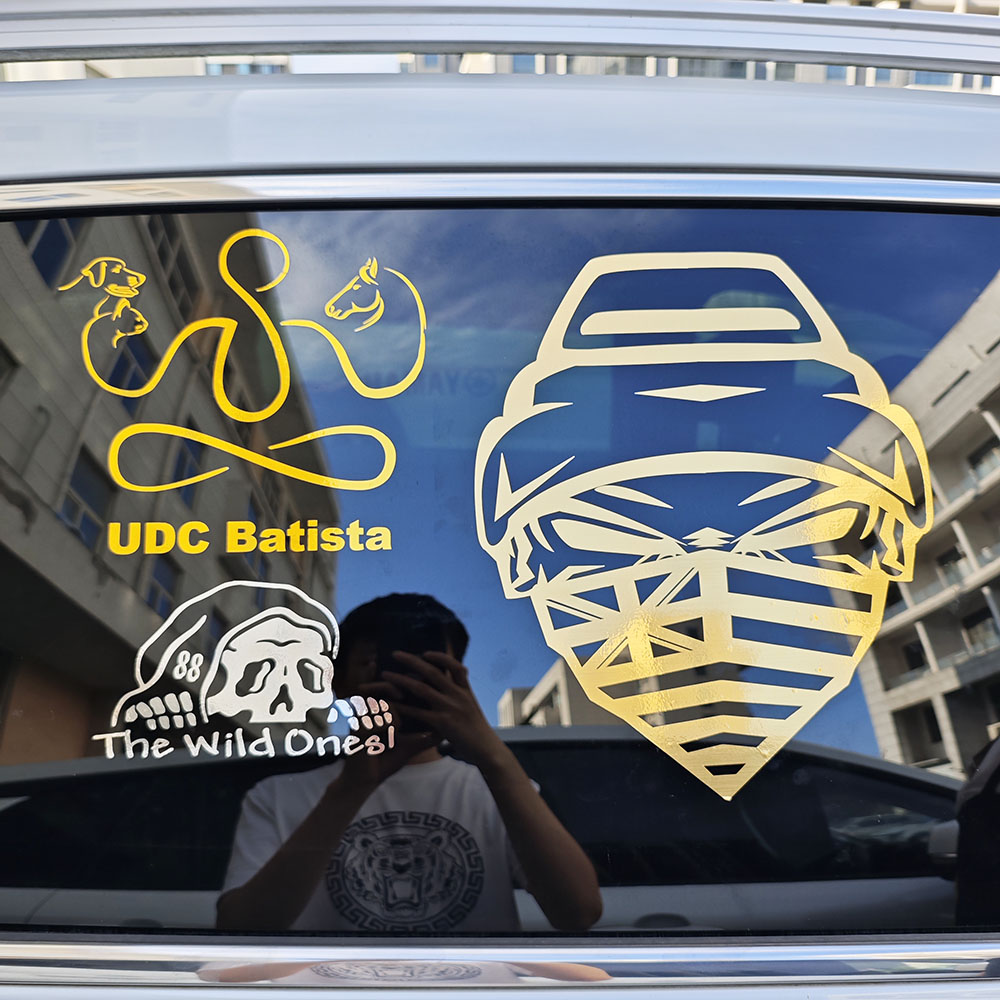 Examples of gold/silver window car decals