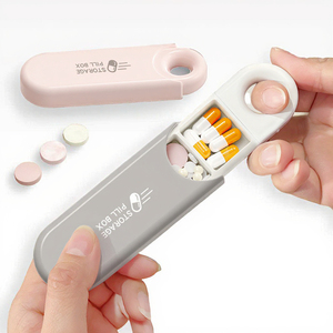 Wholesale New Style Hot Selling Capsule Type Travel Pill <b>Storage</b> <b>Box</b> Flip Top case Pills Mini Plastic - Product Image 1