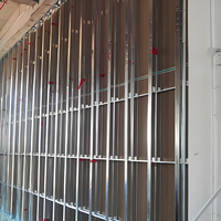 Conception moderne Acier Zinc Canaux de gypse pour plafond Système de cloisons sèches à goujons et rails en métal Plafonds suspendus à cadre en acier