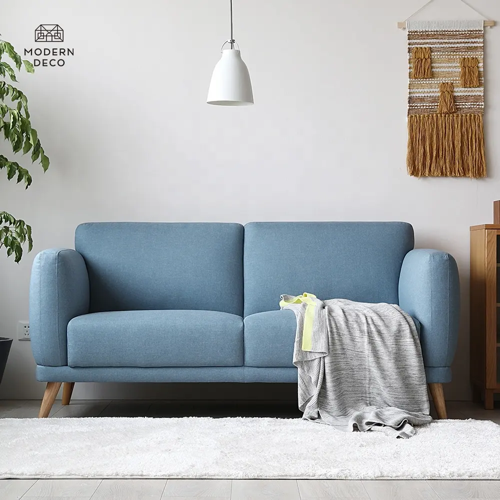 modern blue 2 seater fabric sofa with wooden legs upholstery interior living room furniture