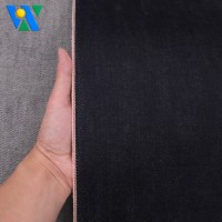 Tela vaquera selvedge de 20 oz, muy pesada, sin elasticidad y rígida, rollos de tela vaquera cruda para chaquetas y prendas vaqueras vintage.