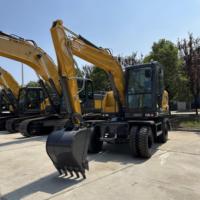 Excavatrice sur pneus d'occasion XE210WGA en excellent état avec pompe et boîte de vitesses, modèle 2020, poids opérationnel de 21000 kg