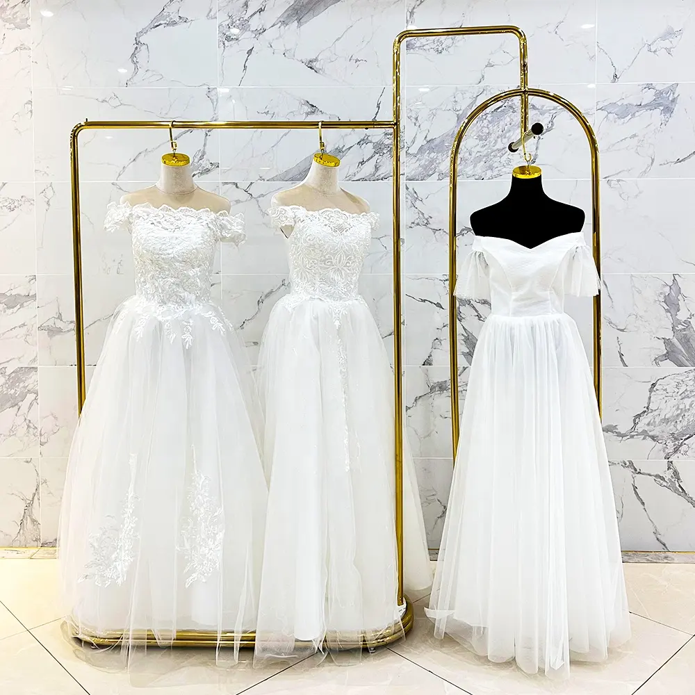 Présentoir de robes de mariée doré, fabricant de Guangzhou, présentoir créatif personnalisé pour robe de mariée