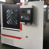Tour CNC vertical VTC630 Jiucheng, broche simple, garantie 1 an, usage moyen, vente directe usine Chine