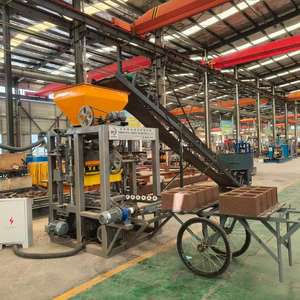 Machine semi-automatique de fabrication de blocs creux QT4-24 pour l'Afrique, machine de moulage de briques de ciment emboîtables - Product Image 1