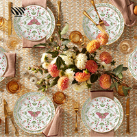 Charmant ensemble d'assiettes en porcelaine papillon délicat et motifs floraux avec bords dorés pour un dîner enchanteur
