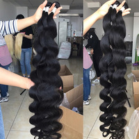 Paquets de cheveux vierges Remy de 30 pouces de long Body Wave pour les femmes noires Extensions de cheveux bruts brésiliens de couleur naturelle Fournisseurs de haute qualité