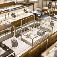 Bijouterie Meubles Vitrines en verre personnalisées Conception Système d'éclairage intelligent à DEL Présentoir à bijoux Fabricant