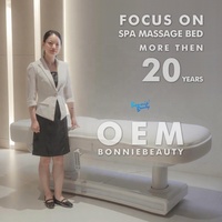 Table de massage électrique réglable de style moderne à 4 moteurs pour salons de beauté, avec grand espace de rangement, en cuir synthétique