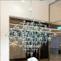 Lustre moderne en cristal K9 pour villa duplex, design ciel étoilé et lucioles, idéal pour salon à plafond haut, éclairage artistique de luxe français en cristal