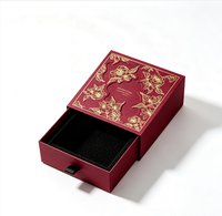 Boîte cadeau de luxe avec tiroir, dorure à chaud, motif floral en relief, papier texturé, emballage pour bijoux, fermeture magnétique, matériaux recyclés, mousse noire
