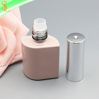 Bouteille de vernis à ongles en gel vide de 8ml en forme de S de haute qualité avec capuchon en argent et brosse pour vernis à gel UV