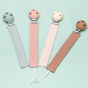 Vente en gros de nouveaux matériaux pince-sucette portable en coton pour bébé pinces binky neutres universellement adaptées à toutes les sucettes pour jouets de bébé - Product Image 1