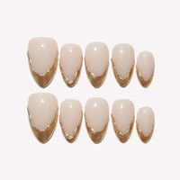 Ongles à presser en acrylique, base nude élégante, bordure dorée, forme amande, personnalisables, vente en gros, matériau fin et souple pour ongles, 10 pièces, pour mariage, fête, usage quotidien